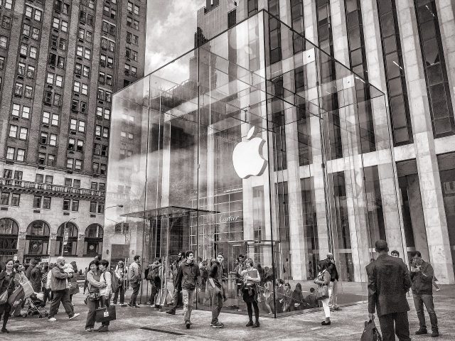 A glass Apple Store in black and white