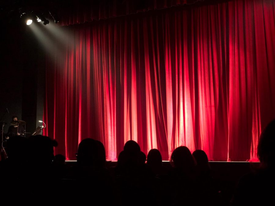 A red curtain in a theater.