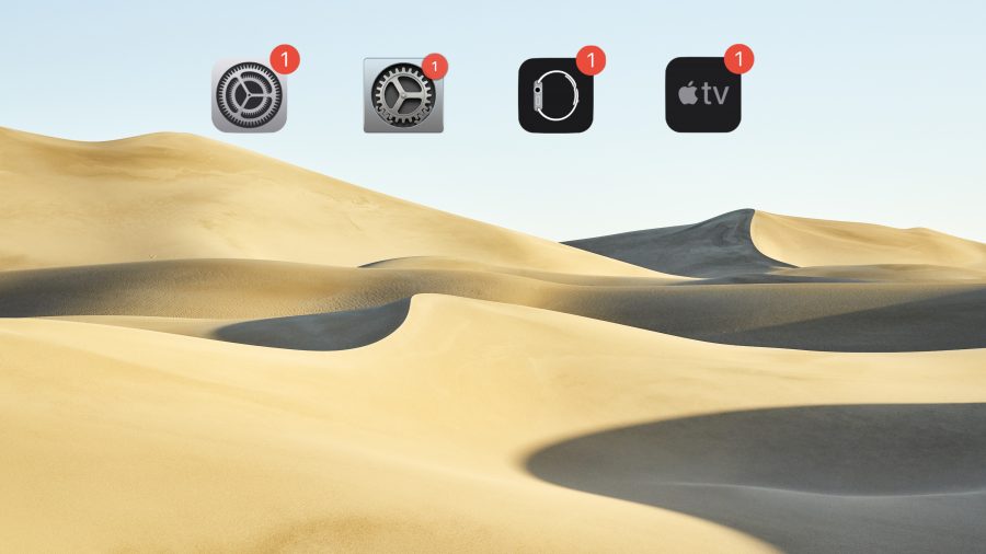 Photo of a desert with four update icons floating over it