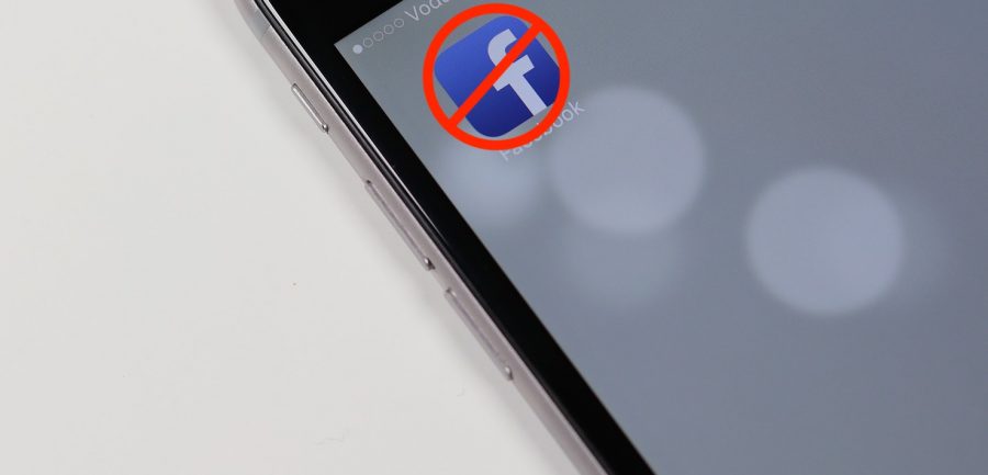 The Facebook iOS app icon with a buster sign over it.
