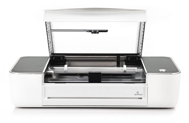 A picture of the Glowforge 2D laser cutter