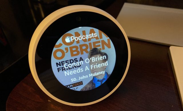 Conan O'Brien playing through Apple Podcasts on an Echo Spot.
