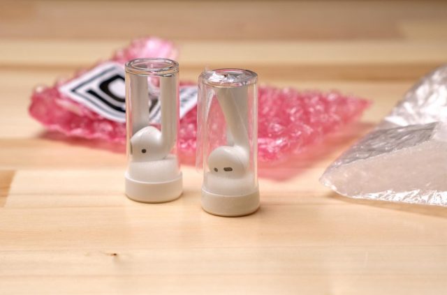 AirPods in tubes