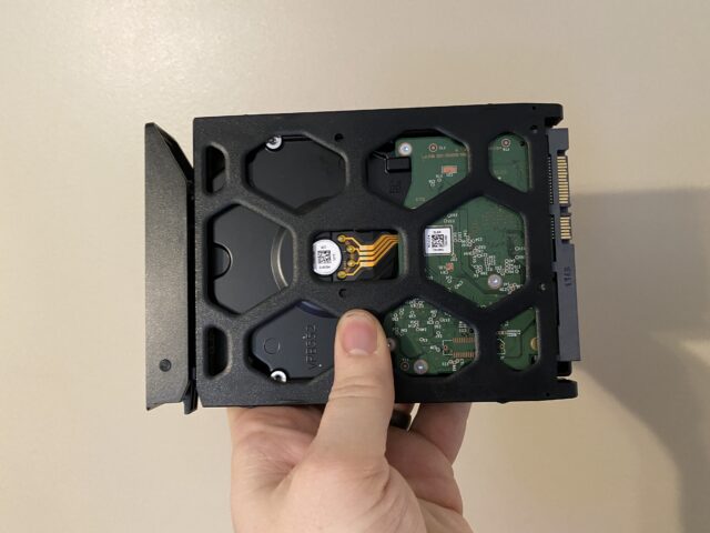  A 6 TB hard drive loaded into one of the Synology caddies, ready to be slotted into the main unit
